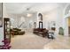 Open living room with high ceilings, a cozy seating area, and lots of natural light at 19275 N 88Th Way, Scottsdale, AZ 85255