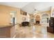 Spacious living room with tile floors and fireplace at 19275 N 88Th Way, Scottsdale, AZ 85255