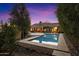 Stunning pool and backyard view at sunset, with outdoor seating at 19275 N 88Th Way, Scottsdale, AZ 85255