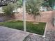 Artificial turf backyard with a pergola and patio at 19814 N 49Th Dr, Glendale, AZ 85308