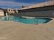 Community swimming pool with surrounding patio at 19814 N 49Th Dr, Glendale, AZ 85308