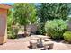 Landscaped backyard with seating area at 20509 N Enchantment Pass, Maricopa, AZ 85138