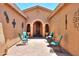 Private courtyard with seating area and brick paving at 20509 N Enchantment Pass, Maricopa, AZ 85138