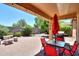 Patio with seating and covered area at 20509 N Enchantment Pass, Maricopa, AZ 85138