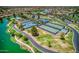 Well-maintained tennis and pickleball courts near a lake at 20509 N Enchantment Pass, Maricopa, AZ 85138