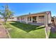 House with grassy backyard and patio at 2142 W Enfield Way, Chandler, AZ 85286