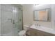 Bathroom with marble shower and modern vanity at 2142 W Enfield Way, Chandler, AZ 85286