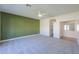 Spacious bedroom with carpeted floors and a large accent wall at 2142 W Enfield Way, Chandler, AZ 85286