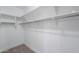 Well-lit walk-in closet with shelves and hanging space at 2142 W Enfield Way, Chandler, AZ 85286