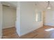 Bright entryway with wood-look floors and arched window at 2142 W Enfield Way, Chandler, AZ 85286