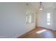 Bright and airy entryway with wood flooring and mirror at 2142 W Enfield Way, Chandler, AZ 85286