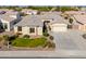 Single-story house with a large front yard and a two-car garage at 2142 W Enfield Way, Chandler, AZ 85286