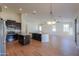 Modern kitchen featuring granite countertops and stainless steel appliances at 2142 W Enfield Way, Chandler, AZ 85286