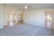 Open living room with high ceilings and neutral color palette at 2142 W Enfield Way, Chandler, AZ 85286