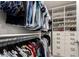 Well-organized walk-in closet with hanging rods and shelves at 2146 W Isabella Ave # 252, Mesa, AZ 85202