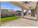 Covered patio overlooks a refreshing pool and grassy area at 22847 E Sonoqui Blvd, Queen Creek, AZ 85142