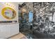 Elegant bathroom with a frameless glass shower and marble tile at 22847 E Sonoqui Blvd, Queen Creek, AZ 85142