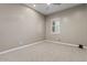 Well-lit bedroom with ceiling fan and neutral tones at 22847 E Sonoqui Blvd, Queen Creek, AZ 85142