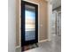 Interior entryway with black door and tile floor at 22847 E Sonoqui Blvd, Queen Creek, AZ 85142