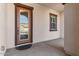 Front entry with glass door and a doormat at 22847 E Sonoqui Blvd, Queen Creek, AZ 85142