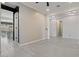 Hallway with tile flooring and views into other rooms at 22847 E Sonoqui Blvd, Queen Creek, AZ 85142