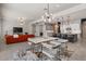 Open concept kitchen with white cabinets and large island at 22847 E Sonoqui Blvd, Queen Creek, AZ 85142