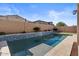 Inviting swimming pool with a tiled water feature at 22847 E Sonoqui Blvd, Queen Creek, AZ 85142