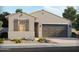 One-story home with a two-car garage and landscaping at 24347 W La Salle St, Buckeye, AZ 85326