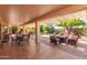 Covered patio with seating area, perfect for outdoor dining at 24502 S Starcrest Dr, Sun Lakes, AZ 85248