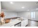 Kitchen island with granite countertops and a double sink at 24550 W Pima St, Buckeye, AZ 85326