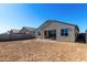 Spacious backyard with a view of neighboring homes at 25233 N 131St Dr, Peoria, AZ 85383