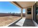 Covered patio perfect for outdoor dining and entertaining at 25233 N 131St Dr, Peoria, AZ 85383