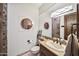 Clean bathroom with modern vanity and a large mirror at 25763 N 116Th St, Scottsdale, AZ 85255