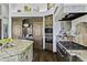 Kitchen with stainless steel appliances and granite island at 25763 N 116Th St, Scottsdale, AZ 85255