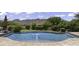 Inviting pool with fountain and mountain backdrop at 25763 N 116Th St, Scottsdale, AZ 85255