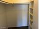 Large bedroom closet with shelving and hanging rod at 2625 E Indian School Rd # 226, Phoenix, AZ 85016