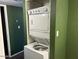 Shared bathroom with stackable washer and dryer at 2625 E Indian School Rd # 226, Phoenix, AZ 85016