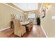 Formal dining room featuring a large table and chandelier at 3111 E Red Oak Ct, Gilbert, AZ 85297