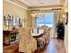 Bright dining room with hardwood floors and elegant chandelier at 3111 E Red Oak Ct, Gilbert, AZ 85297