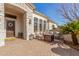 Front patio with seating area and stone flooring at 3412 E Indigo Cir, Mesa, AZ 85213