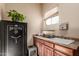 Laundry room with washer, dryer, and utility sink at 3412 E Indigo Cir, Mesa, AZ 85213