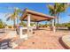 Outdoor kitchen and patio with pergola at 3412 E Indigo Cir, Mesa, AZ 85213