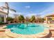 Inviting pool with fountain and spacious patio at 3412 E Indigo Cir, Mesa, AZ 85213