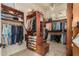 Spacious walk-in closet with ample shelving and hanging space at 3412 E Indigo Cir, Mesa, AZ 85213