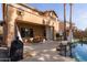 Home with covered patio, pool, and grilling station at 3959 E Gemini Pl, Chandler, AZ 85249