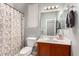 Bathroom with shower/tub combo and wood vanity at 3959 E Gemini Pl, Chandler, AZ 85249