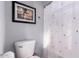 Small bathroom with toilet and fish-themed shower curtain at 3959 E Gemini Pl, Chandler, AZ 85249