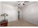 Bedroom with double closet and ceiling fan at 3959 E Gemini Pl, Chandler, AZ 85249