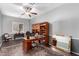 Bright home office with built-in wooden shelves and desk at 3959 E Gemini Pl, Chandler, AZ 85249