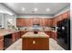 Kitchen with island and stainless steel appliances at 3959 E Gemini Pl, Chandler, AZ 85249